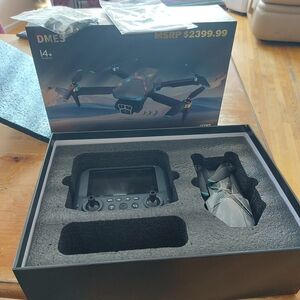 DMES GPS Drone with Controller. NEW SEALED. ONE BUTTON RETURN HOME.